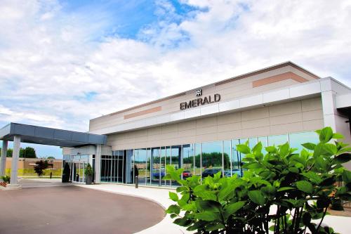a dealership building with a brand sign on it at Residence Inn by Marriott Cleveland Avon at The Emerald Event Center in Avon