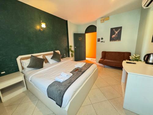 Postel nebo postele na pokoji v ubytování Venice Hotel Hua Hin