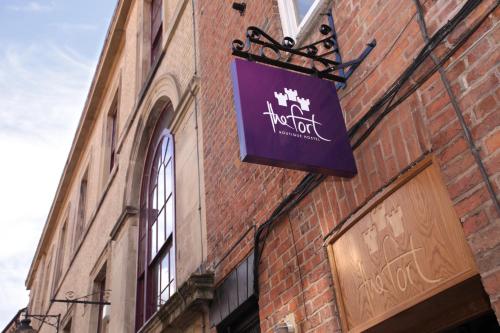 The logo or sign for the hotel 