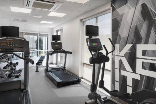 a gym with treadmills and ellipticals in a room at SpringHill Suites by Marriott Syracuse Carrier Circle in East Syracuse