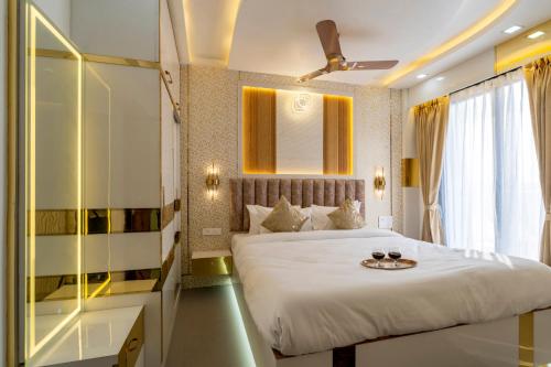 Postel nebo postele na pokoji v ubytování Golden Nest