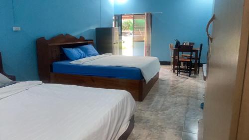 Postel nebo postele na pokoji v ubytování Yok2 Guesthouse