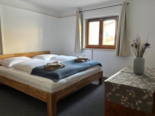 Postel nebo postele na pokoji v ubytování Ferienhaus Lotta