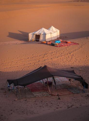 a tent in the middle of the desert at Bivouac Joudour Sahara in Mhamid