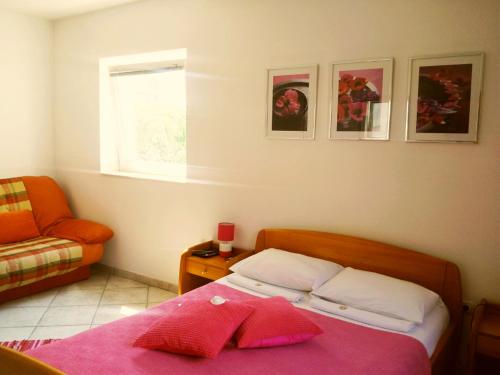 Кровать или кровати в номере Apartments Villa Kukoljac