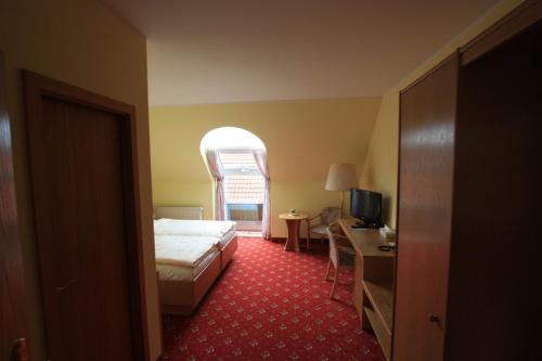 Katil atau katil-katil dalam bilik di Hotel Bürgerhof