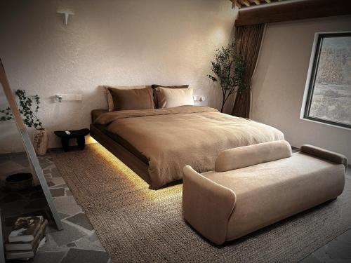 Un ou plusieurs lits dans un hébergement de l'établissement Resort in the valley of Zen 無名川禅意概念酒店