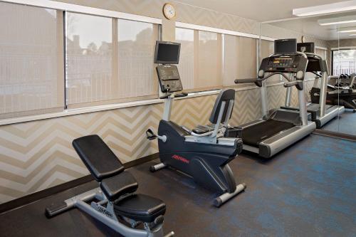 a gym with two exercise bikes and a treadmill at Residence Inn Denver Tech Center in Greenwood Village
