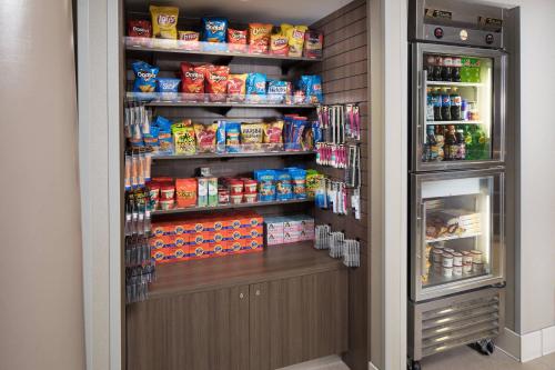 a refrigerator filled with lots of food and drinks at Residence Inn Denver Downtown in Denver