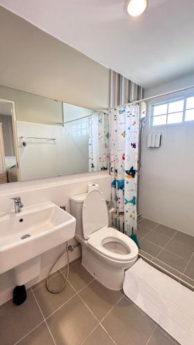 a bathroom with a toilet and a sink at Indy2 Bangna km7 By koii in Bang Kew Yai
