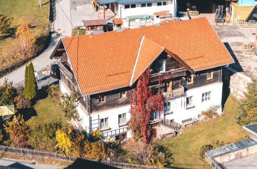 an overhead view of a house with an orange roof at Mountain Resort in Rangersdorf