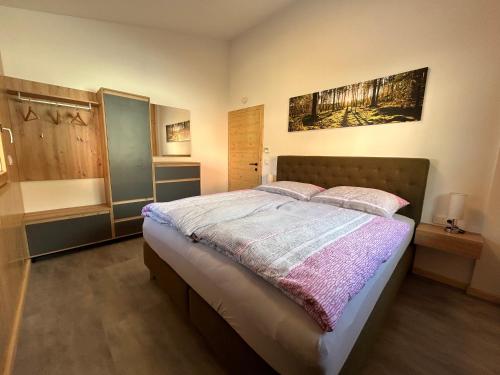 Postel nebo postele na pokoji v ubytování Panorama-Apartment Ennstalblick