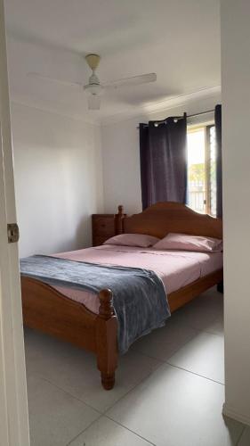Ένα ή περισσότερα κρεβάτια σε δωμάτιο στο 4BHK House in a perfect location
