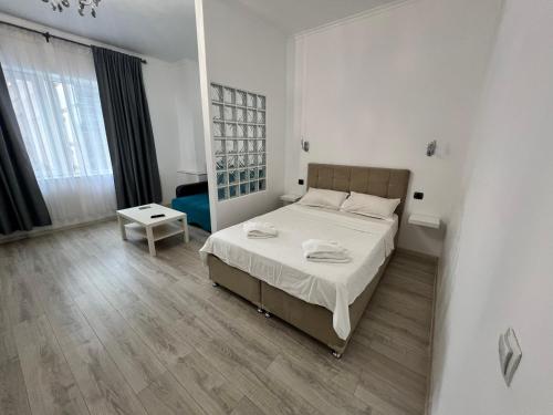 Ένα ή περισσότερα κρεβάτια σε δωμάτιο στο Bright & Beautiful Studio in Prime Location Walk to Everything