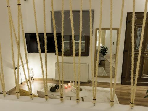 a room with bamboo poles in a room at PS Apartment Polydrosos - PS Rental in Polydrossos