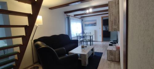 Posezení v ubytování S&H Ferienwohnung