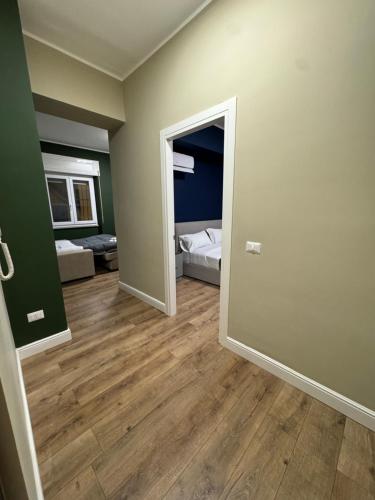 an empty room with a hallway with a bedroom at Il Rifugio in Piazza in Castel di Sangro
