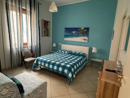 Ένα ή περισσότερα κρεβάτια σε δωμάτιο στο B&B Sogno di Mare