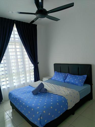 Una cama o camas en una habitación de Dream Anderson Condo