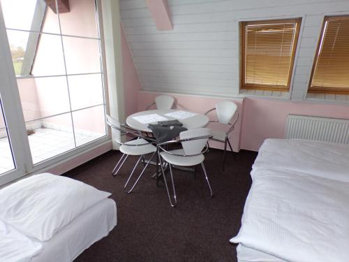 Postel nebo postele na pokoji v ubytování Motel Oseček