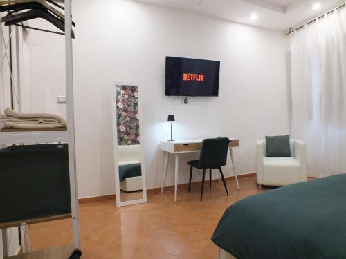Ένα ή περισσότερα κρεβάτια σε δωμάτιο στο Bilocale in Palazzo del XVI Secolo