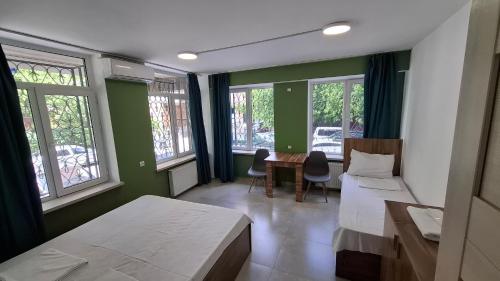 Postel nebo postele na pokoji v ubytování Best Hostel