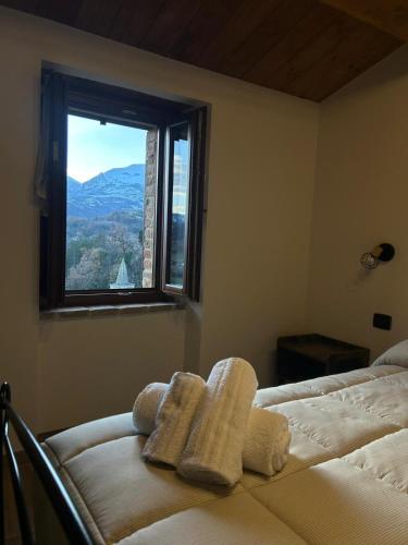 Ένα ή περισσότερα κρεβάτια σε δωμάτιο στο Sibilroom - Rooms & Wellness