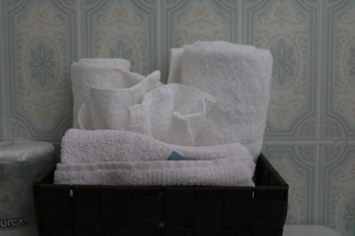 a box filled with white towels in a room at Wakaw Lodge Motel in Wakaw