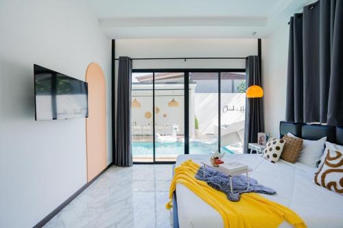 Ένα ή περισσότερα κρεβάτια σε δωμάτιο στο Cherish House Pool Villa