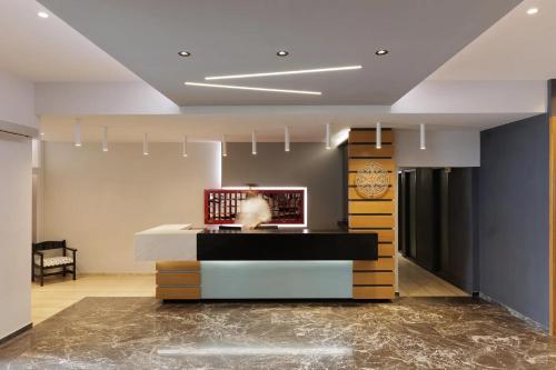 TV a/nebo společenská místnost v ubytování Aphrodite Beach Hotel Corfu