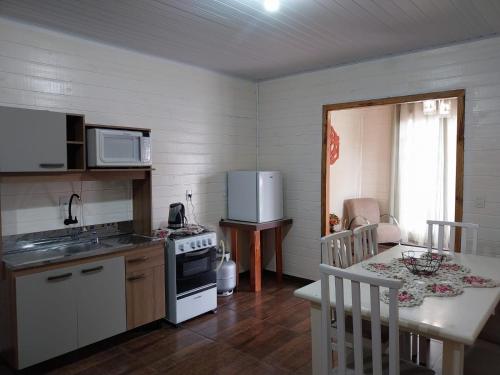 Køkken eller tekøkken på Cabanas La Colonial no Centro