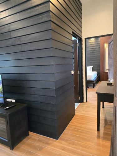 Μια τηλεόραση ή/και κέντρο ψυχαγωγίας στο Blue Palm Residence Kata