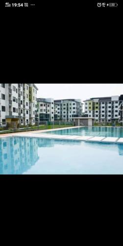 a large pool of water with buildings in the background at Josephine Macatula in Santa Rosa