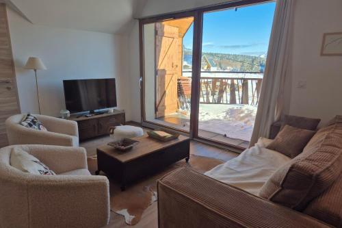 Photo de la galerie de l'établissement Magnifique appartement au pied des pistes - Le trelod, à La Féclaz