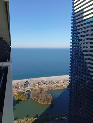 a view of the water from a building at Orbi sea view aparthotel in Angisa