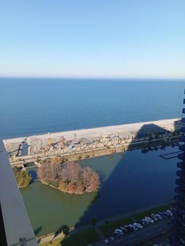an aerial view of a beach and a body of water at Orbi sea view aparthotel in Angisa