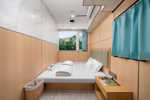 Postel nebo postele na pokoji v ubytování Windsor Hella Inn