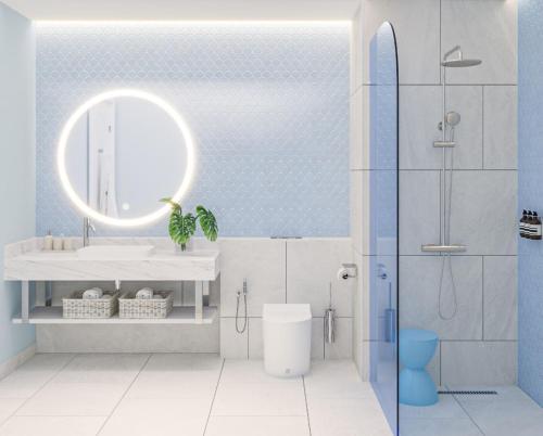 a bathroom with a sink and a mirror at Eriyadu Island Resort in Reethi Rah