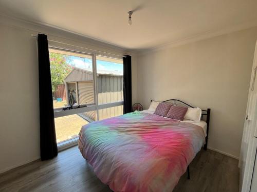 Una cama o camas en una habitación de The Nest