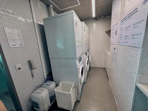 Et badeværelse på 1508 - Rentaqui Studio com Charme Conforto Jardins