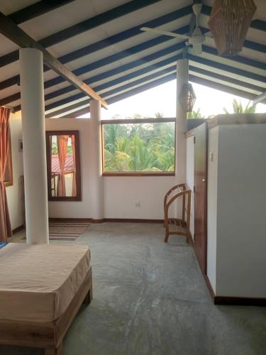 Sri Lanka Surf Villa Domus Graziellaにあるベッド