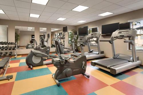 a gym with treadmills and elliptical machines at Residence Inn San Diego North/San Marcos in San Marcos