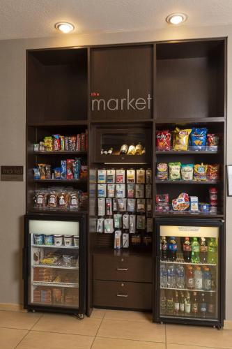 a store with two refrigerators with food and drinks at Residence Inn Durango Downtown in Durango