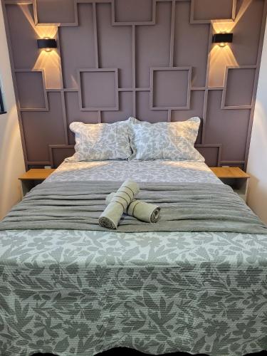 Una cama o camas en una habitación de Brisa do Mar
