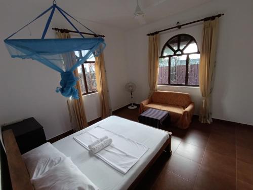 Postel nebo postele na pokoji v ubytování S and P Airport transit hostel and villa 01