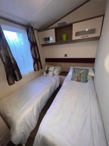 Postel nebo postele na pokoji v ubytování Pine Rise Caravan