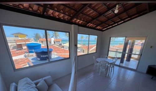 Posezení v ubytování Duplex Praia do frances pe na areia