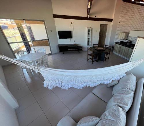 TV a/nebo společenská místnost v ubytování Duplex Praia do frances pe na areia