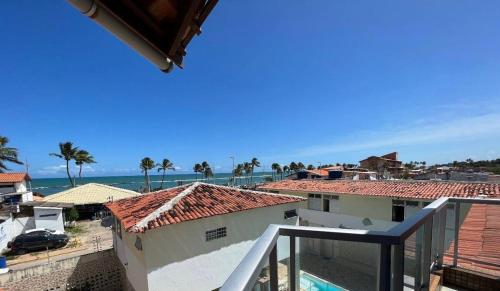 Balkón nebo terasa v ubytování Duplex Praia do frances pe na areia