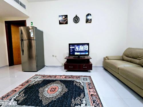 Spacious 2 Bed Room Apartment with 2 bathroomsにあるテレビまたはエンターテインメントセンター